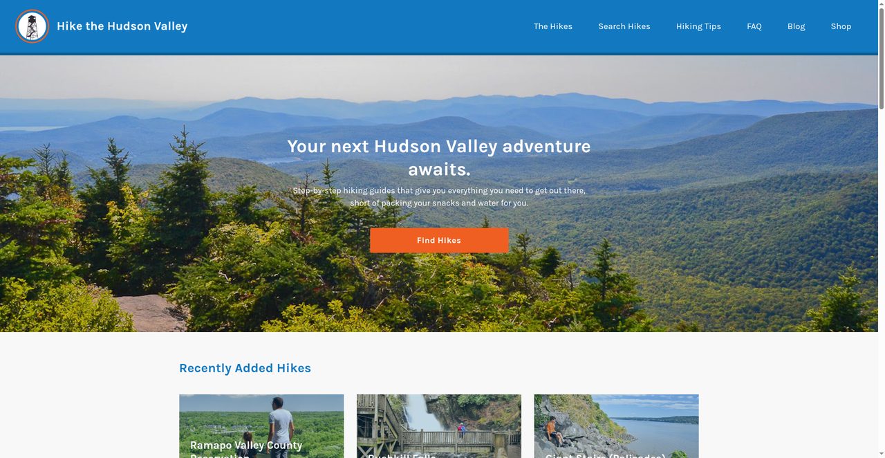 Hudson Valley ridge trail with distant valley views and forested peaks